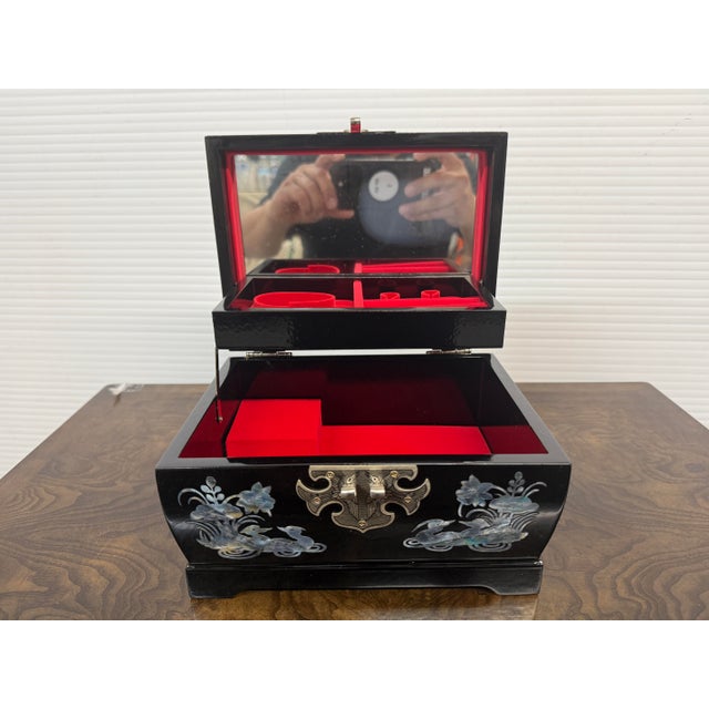 Design Plus Gallery presents a Jewelry Box with Mother of Pearl Inlays. The box on the outside is resplendent with shiny...