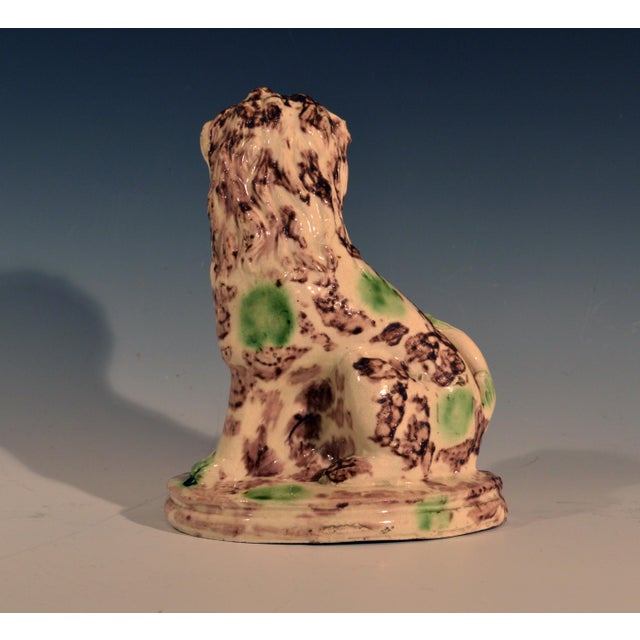 English Creamware Pottery Model of a Seated Lion, with a Whieldon-type tortoise-shell glaze, Circa 1765-85 (Ref:...