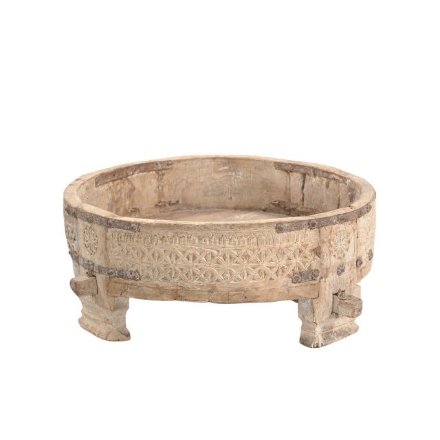 This Vintage Indian Carved and Bleached Teakwood Grinder Table is a remarkable example of traditional Indian...