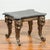 A bronze style side table from the mid-20th century with black marble top. Created with the traditional technique of the...
