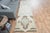 Vintage Hand-Knotted runner rug is a semi-antique vintage area rug. The '70s Eastern region of Anatolia's unique rug is...