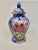 Vibrant vintage ginger jar. Blue background with multicolor floral design. Striking and perfect to add a pop of color to...