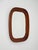 Elegant wall mirror with a curved frame in solid mahogany. The mirror features a rectangular shape with generously rounded...