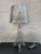 Tall clear acrylic lamp design by Ferruccio Laviani for Kartell, Italy. The manufacture’s mark is located on the base and...