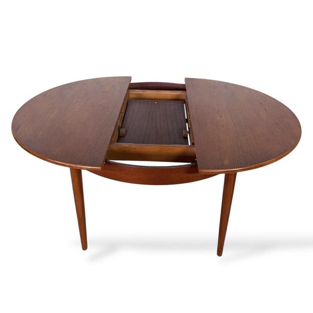 Brown Mid-Century Extending Teak Dining Table Round to Oval Butterfly Leaf Table from Elliotts of Newbury, 1960s For Sale - Image 8 of 11