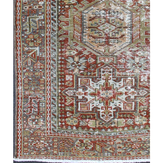 Measures: 2'11 x 4'5. Antique Persian Karajeh Rug with Geometric Medallions and Rust Red Field. Keivan Woven Arts / rug...