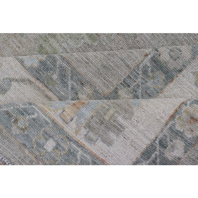 All-Over Floral Modern Oushak With Light Tan Background and Cream Border For Sale - Image 11 of 12