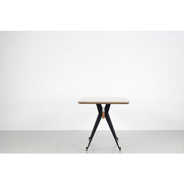 This italian dining table with six armchairs was designed by carlo ratti in the 1950s. The table and chairs were...