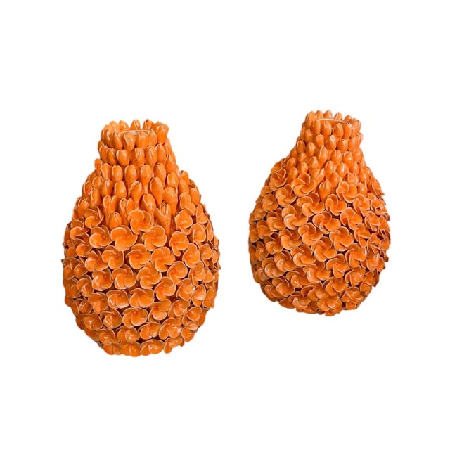 An exceptional and highly decorative pair of vintage Mid-Century modern ceramic vases, meticulously handcrafted in Italy....