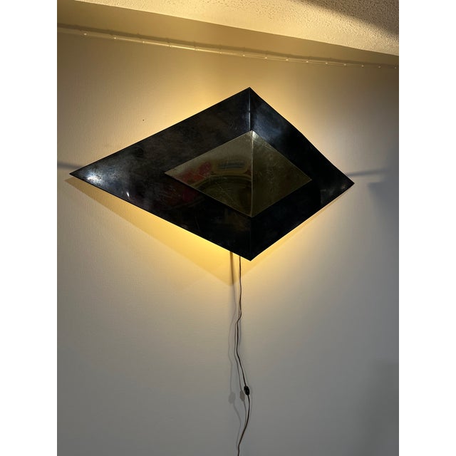 This 48-inch Curtis Jere' wall lamp mounted and illuminated confirms just how striking and ahead of its time this piece...