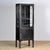 Vintage medicine cabinet from the 1970s, produced in Hungary. The cabinet is made of iron and glass, with the glass held...