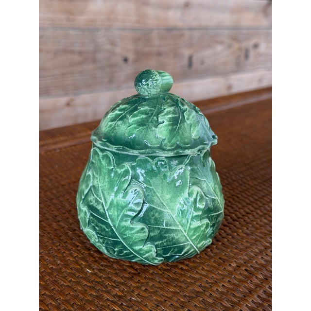 A charming covered sugar bowl from the Vietri Foglia Fresca collection, featuring sculpted leaf relief and rich variegated...