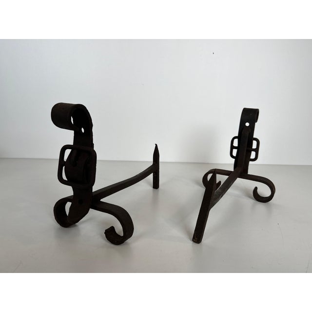 1950s Pair of cast iron andirons representing a belt. French work. For Sale - Image 9 of 12