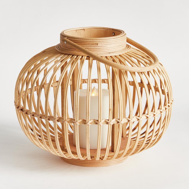 Made of rattan and bamboo, this simple woven lantern really makes a statement. At home in the coastal setting or anywhere...