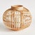 Made of rattan and bamboo, this simple woven lantern really makes a statement. At home in the coastal setting or anywhere...