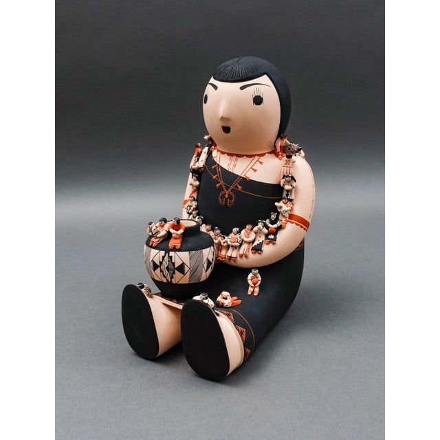 Dena Suina Cochiti Pueblo New Mexico Storyteller 30 Children Pottery Sculpture Measures approximately 6 1/2" long, 4 1/2"...