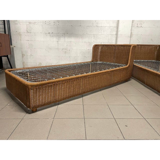 Set of single beds with matching rattan bedside table dating back to the 1980s. Beauty, functionality and respect for the...