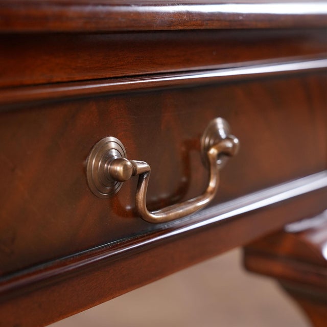 A Chippendale style Ball and Claw Mahogany Lamp Table produced by Niagara Furniture with an attractive mahogany top...