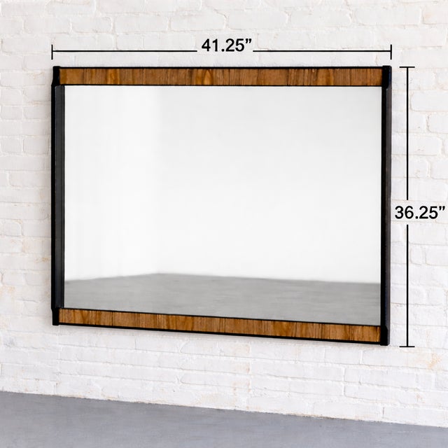 Large Mid century modern mirror by Kent Coffey's Teakway line, circa 1960's. This unique mirror features an ebonized and...