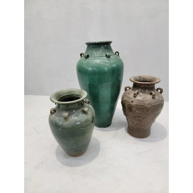 Antique Stoneware Small Green-Glazed Mataban Jar / Vase This large antique Chinese vase/jar has six small carved handles...