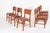 A beautiful set of six Danish dining chairs designed by Ib Kofod-Larsen, dating from the 1960s. These elegant chairs...
