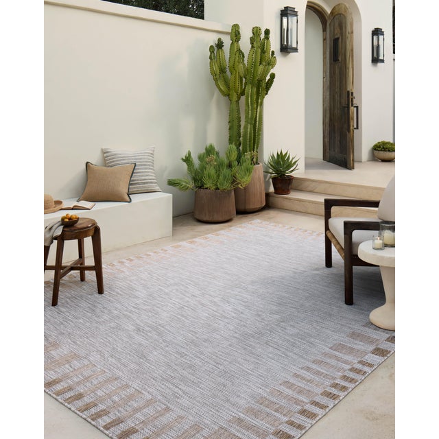 Inspired by the scenic mountain town in California, the Topanga Collection is an indoor/outdoor rug made of durable...