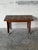 This mobile coffee table features an inset glazed ceramic tile top and a convenient lower wire rack. Smooth rolling...