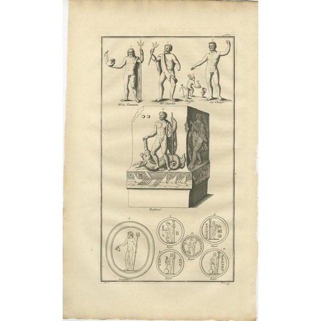 Neptune / Poseidon Sculptures and Coins – Roman Antiquity Engraving, 1721 This finely engraved plate presents a scholarly...