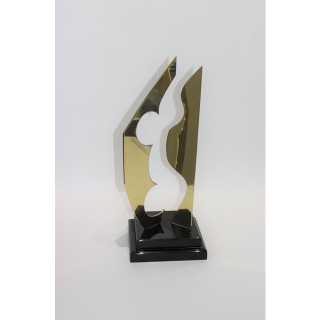 Hivo Van Teal Signed Abstract Sculpture in Polished Brass and Black Lucite from a Palm Beach estate has been...