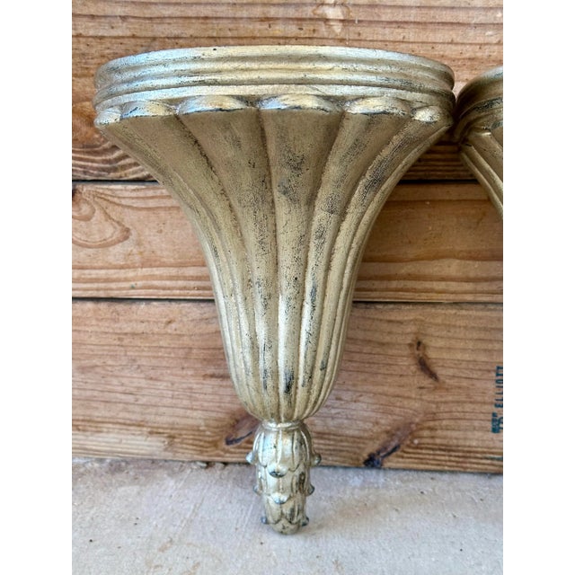 Architectural, sculptural, and unmistakably Maitland-Smith. This handsome pair of vintage wall brackets was handcrafted in...