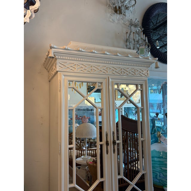 Vintage Pagoda armoire, bar, mirrored fretwork fret work cabinet with bells. Light inside cabinet that lights up shelf....