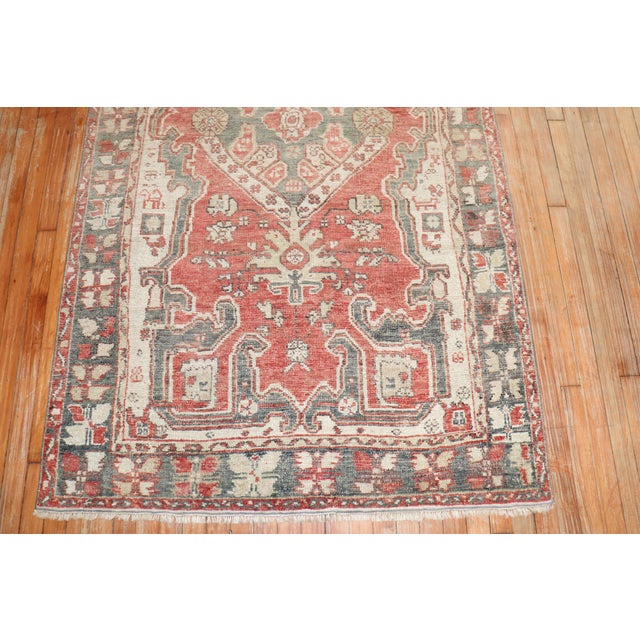 A vintage Turkish Kula carpet from the 2nd quarter of the 20th century in brick red, ivory, brown and gray Measures: 4'3''...