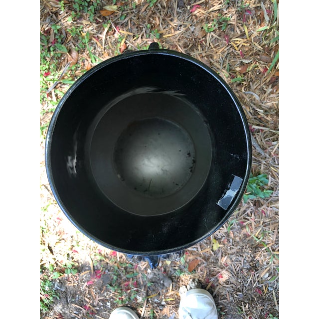 Extra-large ebony ceramic urn featuring detailed twisted rope handles. A perfect addition to any space requiring elegance...