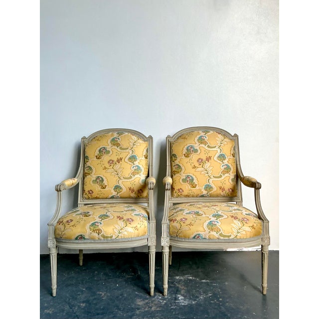 Infuse your home with the sunny elegance of a French chateau with this exquisite pair of vintage Louis XVI style...