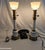 A pair of vintage Stiffel table lamps featuring a white opal glass shade and brass accents. These lamps have a classic...