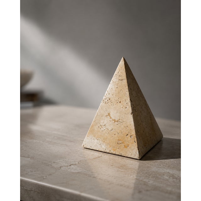 Attributed to the iconic Mannelli Brothers workshop, this majestic pyramidal sculpture is a celebration of pure geometry...