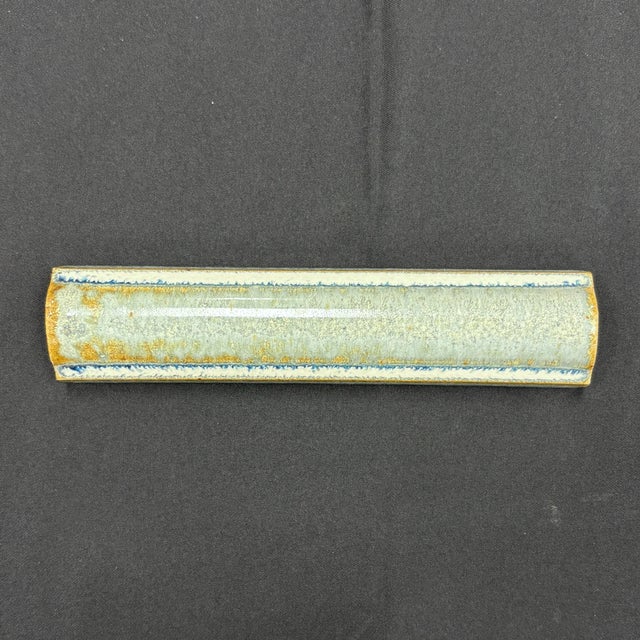 1-1/4" x 6" ceramic rail molding with a sea foam glaze and glossy finish. Moldings are handmade and hand glazed. High...