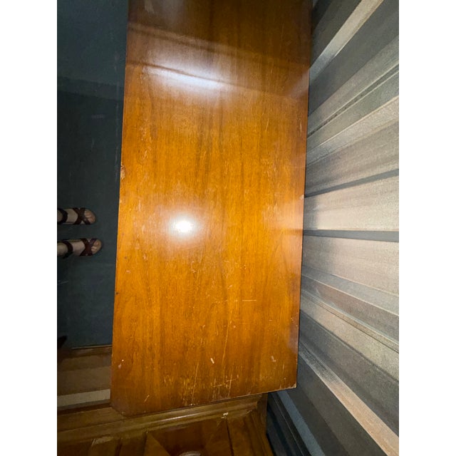 A long nine-drawer dresser from J.L. Metz Furniture Co., dated 1967, part of a coordinating bedroom suite. The case...