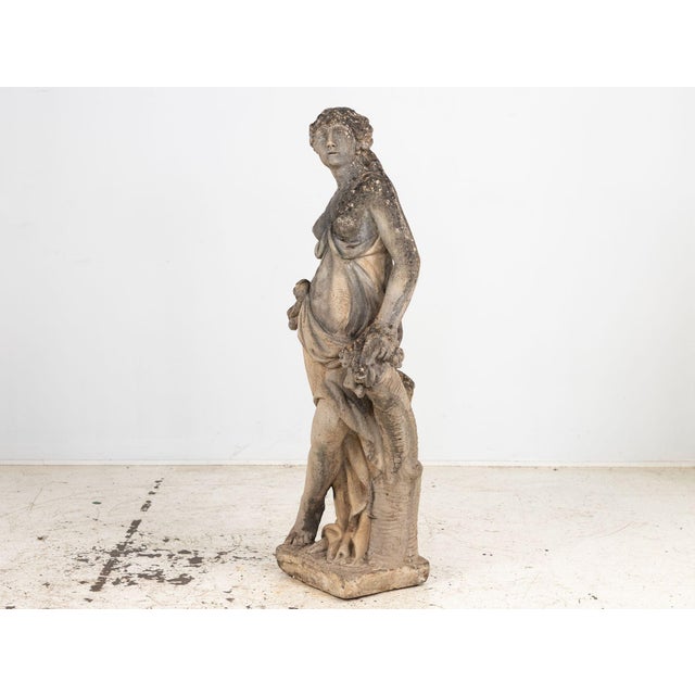 Capture the essence of the winter season with this striking Goddess of Winter concrete garden statue. Elegantly draped in...