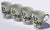 The Set of 4 Christmas Holly Footed Mug by All the Trimmings is a vintage porcelain mug featuring a festive holly design,...