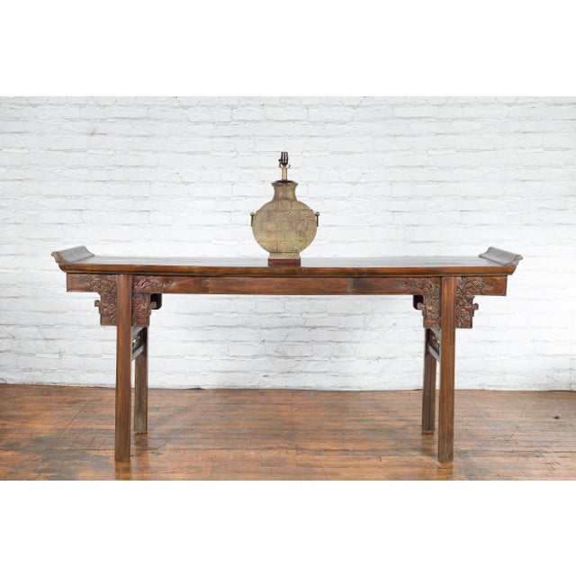 A vintage Han style bronze table lamp from the mid-20th century, with circular body, wired for the US. Created in Thailand...