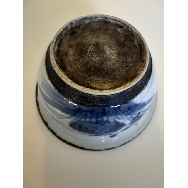 Antique Chinese porcelain bowl. Small in stature. Pretty hand painted cobalt blue and white with brown rim detail.