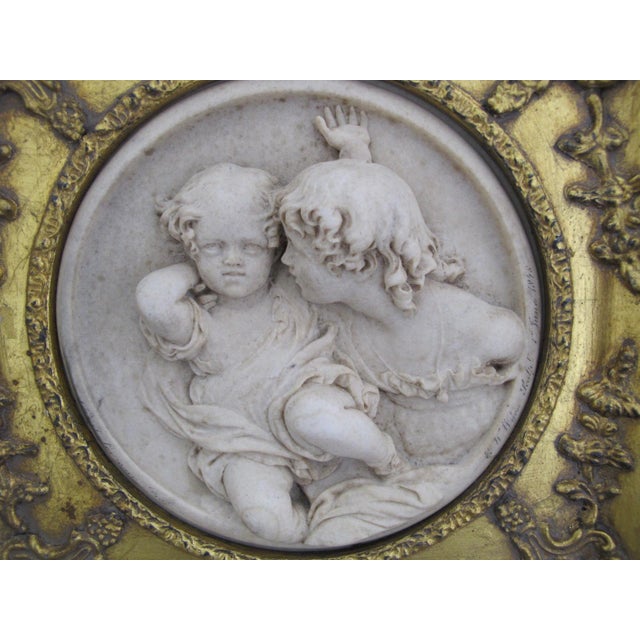 Marble relief plaque depicting two cherubs or putti children by the sculptor Edward William Wyon (1811-1885). Signed and...