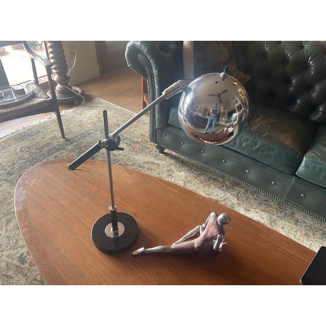 Adjustable chrome table or desk lamp by Robert Sonneman, circa 1965.. The lamp has been professionally rewired and is in...