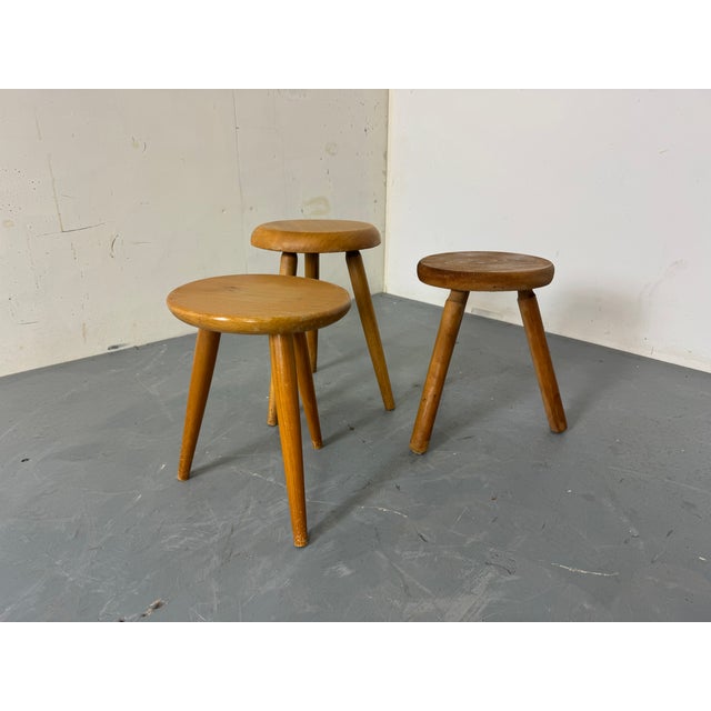 3 mid Century French elm wooden stools. Can also be used as beautiful side tables or plant stands. Nice functional and...