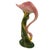 Mid-century pink and green long-legged flamingo ceramic figurine. The statue detailed a pink flamingo with long legs, a...