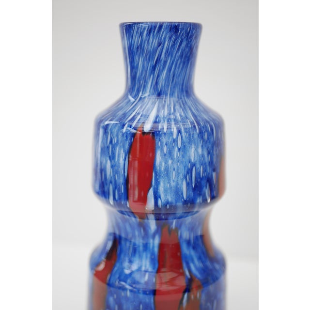 Stunning, iridescent blue glass 'Flora' vase with red details. Made by Frantisek Koudelka for Prachen, Czech Republic,...