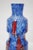 Stunning, iridescent blue glass 'Flora' vase with red details. Made by Frantisek Koudelka for Prachen, Czech Republic,...