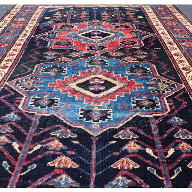 Early 20th Century Antique Persian Kurdish Tribal Rug in Sub-Geometric Medallion Design 4'5 X 7'8 For Sale - Image 5 of 10