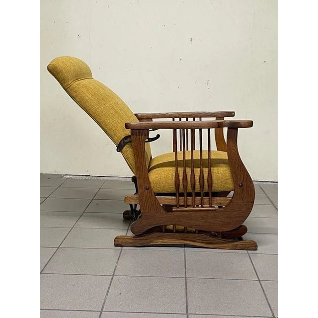 Extremely rare rocking chair from the late 19th - early 20th century, completely restored. Oak frame and new upholstery....